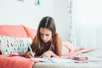 pre teen girl writing diary
