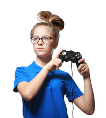 Wall Mural - Pretty teenager with game controller on white background