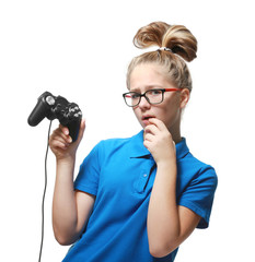 Wall Mural - Pretty teenager with game controller on white background