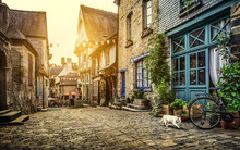 Charming Street Scene In An Old Town In Europe At Sunset