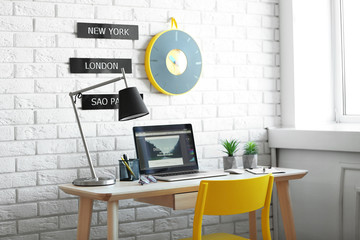 Poster - Workplace with laptop on table in modern room