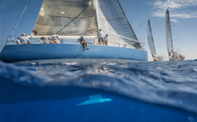 Blue Sailing Boat On The Sea With Keel Under Water