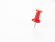 © ddukang - Red Push pin on white background.