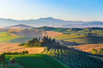 scenic tuscany landscape at sunrise, val d'orcia, italy