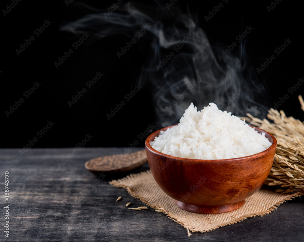 Smoking Rice Cooked rice with smoke in wooden bowl,dark background Stock Photo ...
