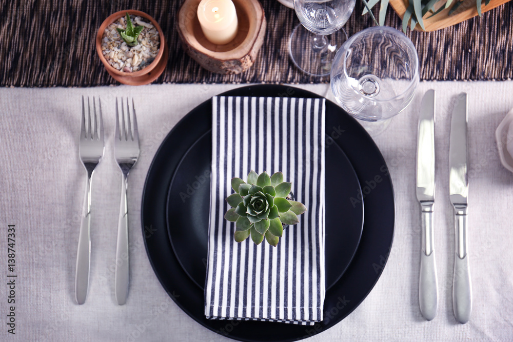 Table served with succulents for dinner