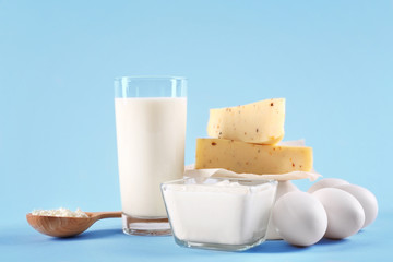 Poster - Different dairy products on color background