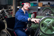 Young Mechanic Apprentice In Wheelchair Working On Turning Lathe