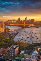 Wall Mural - Sydney. Cityscape image of Sydney, Australia with Harbour Bridge and Sydney skyline during sunset.