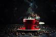 Black coffee in a red cup, black background, selective focus