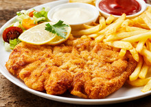 Schnitzel And French Fries Dish