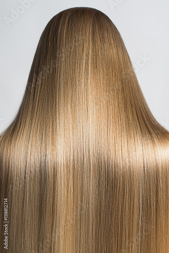 Portrait Of A Beautiful Young Blond Woman With Long Straight Hair