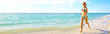 © grinny - Woman running on the beach