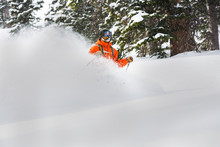 Skier Engulfed In Snow Dust 