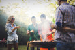 © NDABCREATIVITY - Happy people having camping and having bbq party
