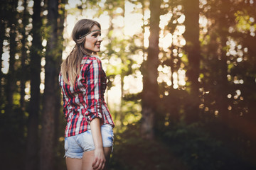 Wall Mural - pretty woman hiking in forest