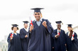 © Syda Productions - happy student with diploma celebrating graduation