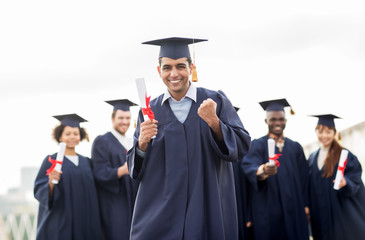 Canvas Print - happy student with diploma celebrating graduation