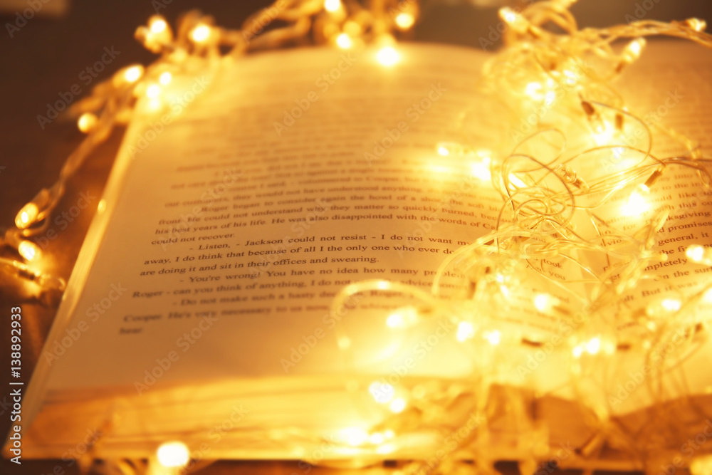 Close up view of book and beautiful garland