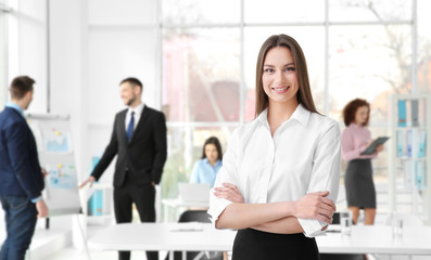 Sticker - Businesswoman with crossed hands in office