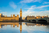 Fototapeta Big Ben - Big Ben and Westminster parliament with blue sky and water reflection in London, UK