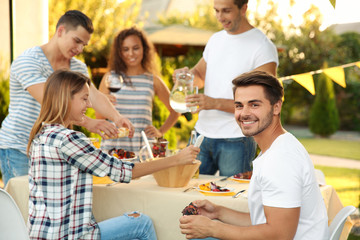 Sticker - Young friends having barbecue party in garden