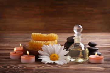 Poster - Spa concept. Natural treatments and candles on wooden background