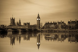 Fototapeta Londyn - Vintage picture of London Big Ben and House of Parliament viewed at sunrise in London. England