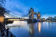London Tower Bridge and Thames river viewed at sunrise in London, England