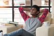 © wong yu liang - indian teenage male relaxing at home