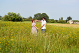 Fototapeta Kuchnia - Happy middle-aged couple on nature in countryside