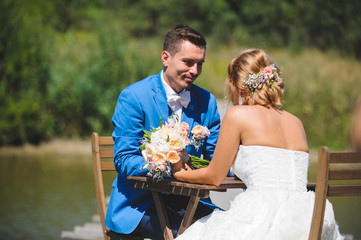 Wall Mural - Couple at Table with Bouquet