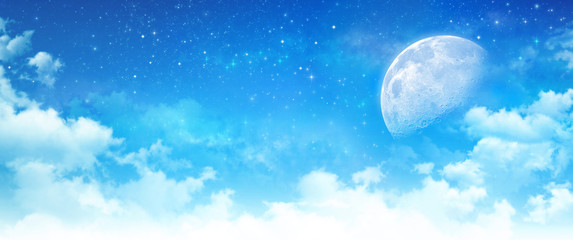 Wall Mural - moon light in a cloudy blue sky