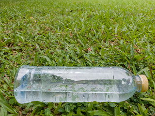 water bottle on grass