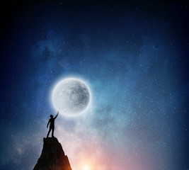 man and full moon . mixed media