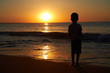 © graghine - litle boy sunset at the sea