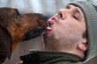 © Rionegro - dog licking his lord