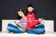 © LIGHTFIELD STUDIOS - couple using smartphones