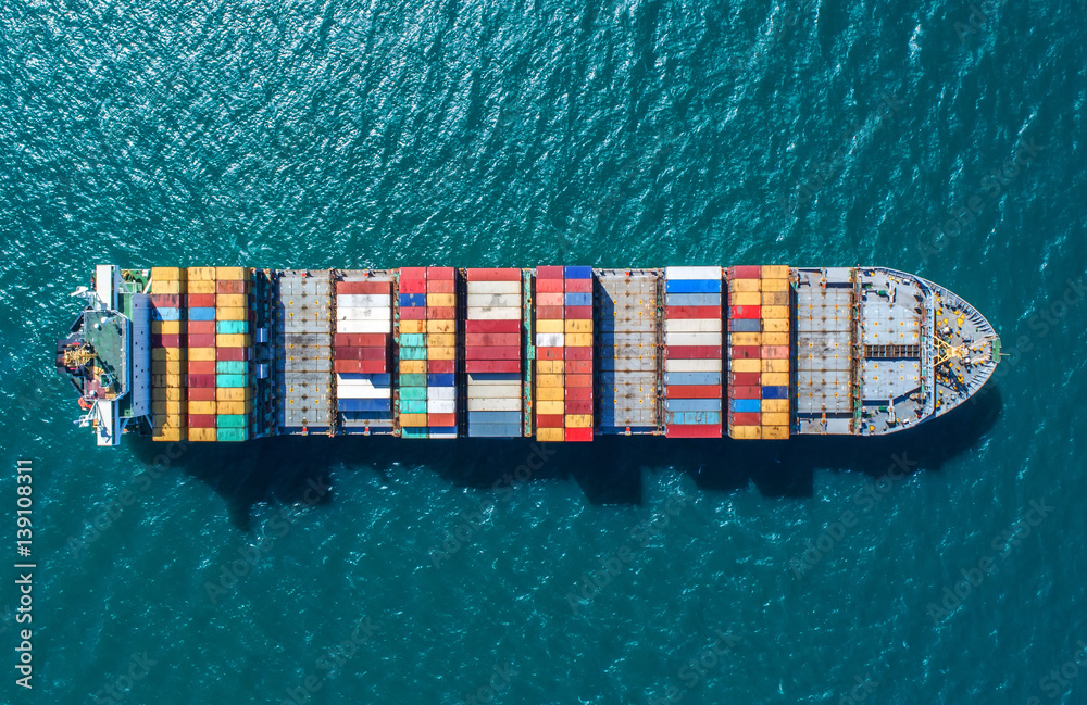 container ship in import export and business logistic.By crane ,Trade Port , Shipping.cargo to harbor.Aerial view.Water transport.International.Shell Marine.Top view. - obrazy, fototapety, plakaty 