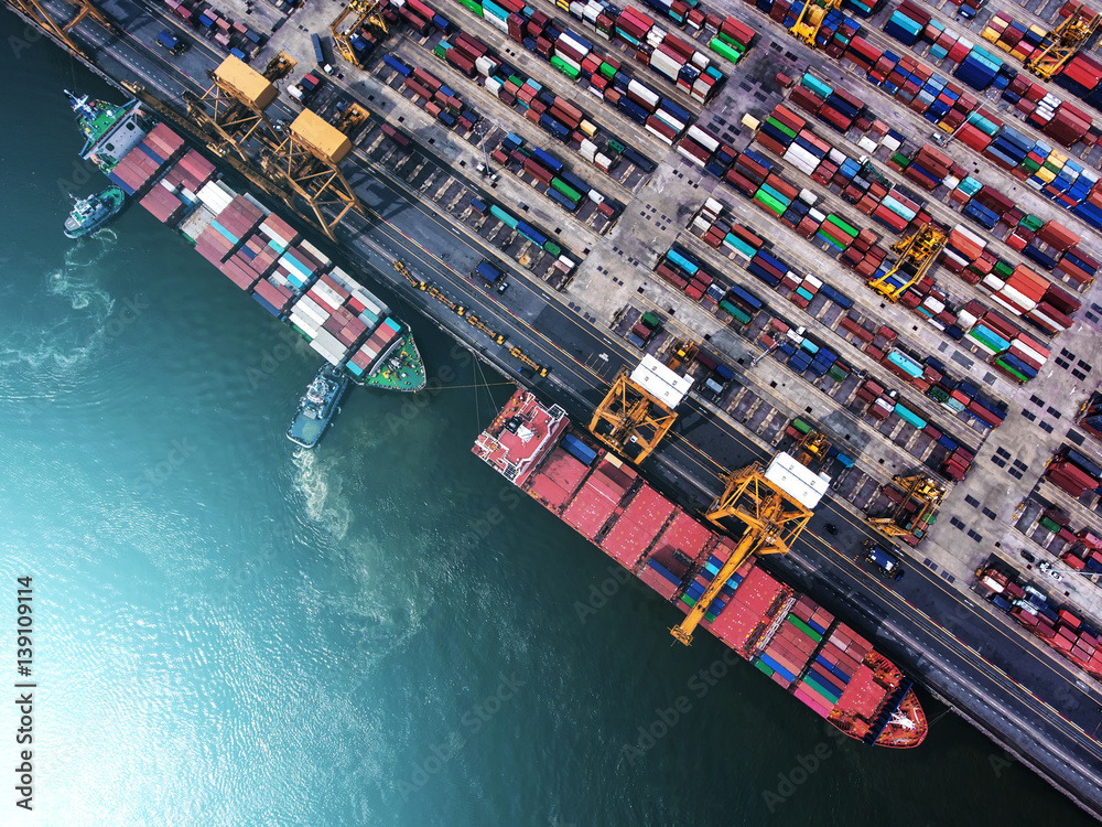 container ship in import export and business logistic.By crane ,Trade Port , Shipping.cargo to harbor.Aerial view.Water transport.International.Shell Marine.Top view. - obrazy, fototapety, plakaty 