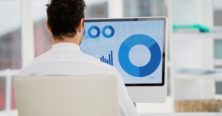 Poster - Man using desktop pc in the office