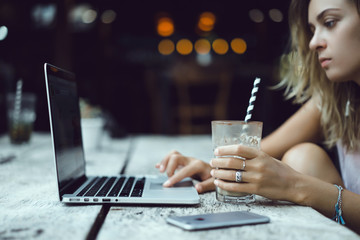 pretty young beauty woman using laptop in cafe, outdoor portrait business woman, hipster style, internet, smartphone, office