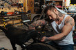 © Viacheslav Yakobchuk - Infatuated biker repairing his motorcycle