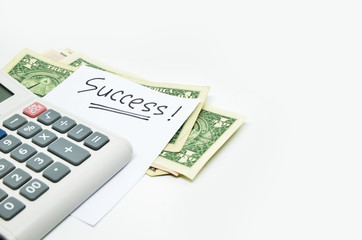 Calculator, money and success word