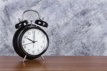 Canvas Print - 10 o'clock vintage clock on wood table and wall background