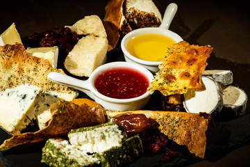 Wall Mural - Look from above at plate with dishes and bowls with sauces