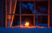 Snowy Wooden Window, Christmas Decoration And Candles