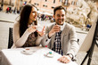 © BGStock72 - Loving couple drinking coffee in Rome, Italy