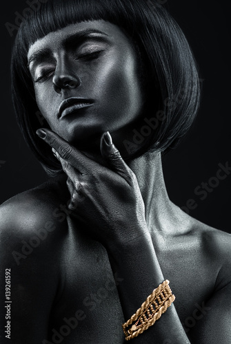 Fototapeta dla dzieci Fashion portrait of a dark-skinned beautiful girl with jewerly.