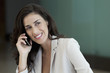 © PhotoAlto - Businesswoman talking on cell phone
